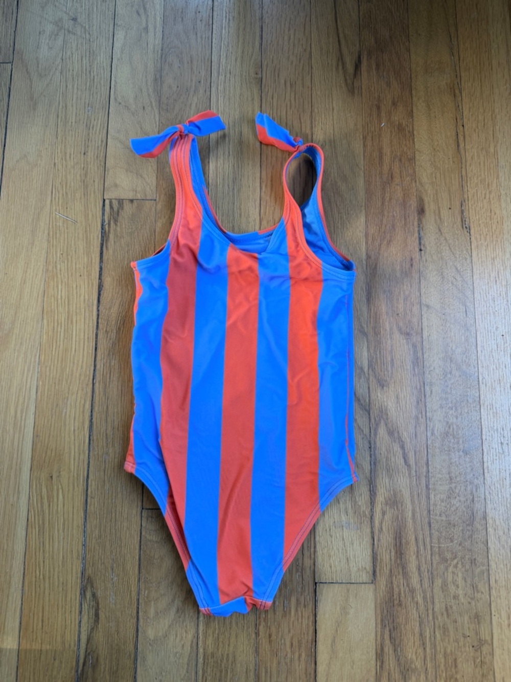 Coral reef orange and blue striped one piece bathing suit